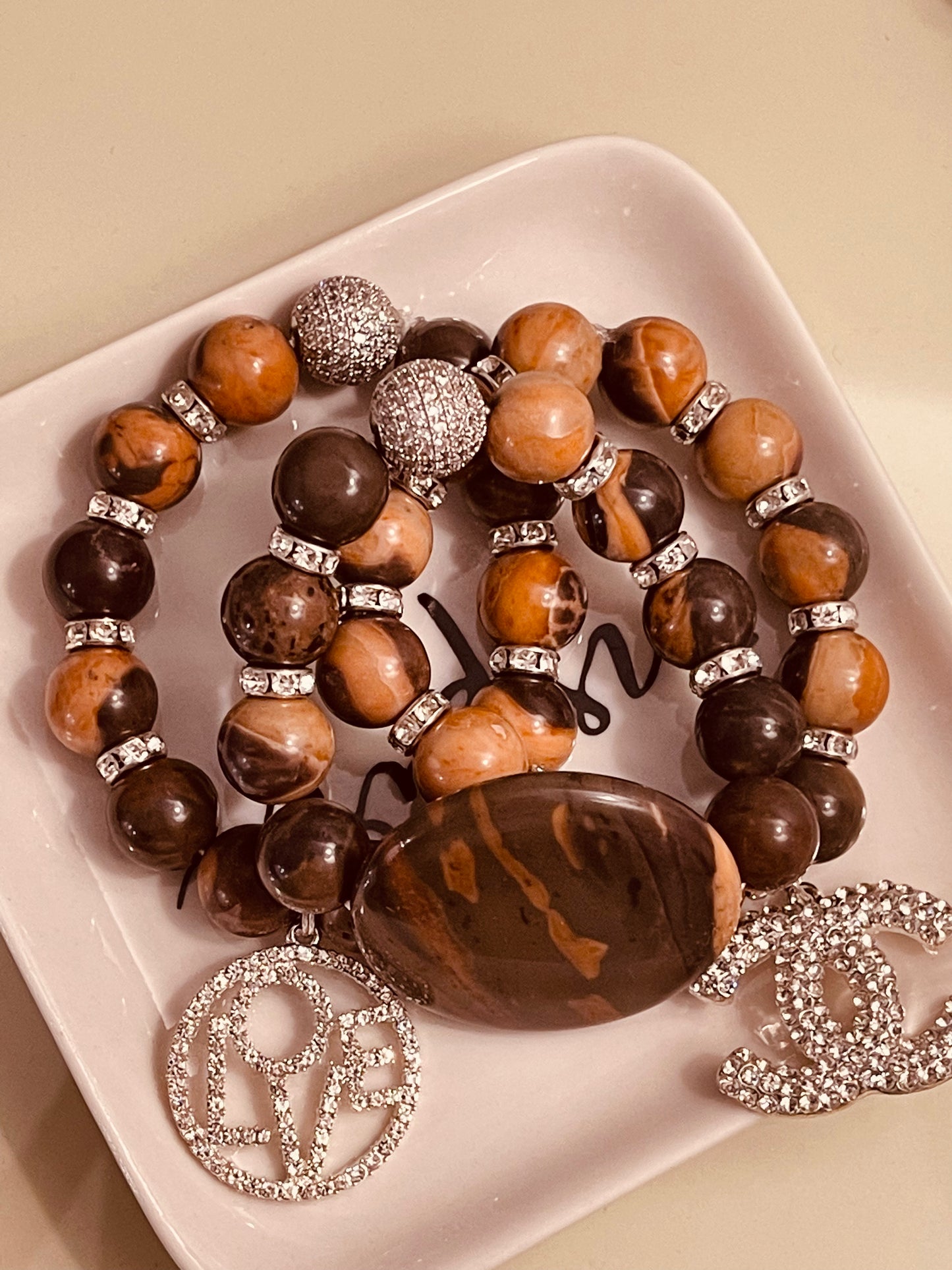 Brown 3 piece bracelet with charms